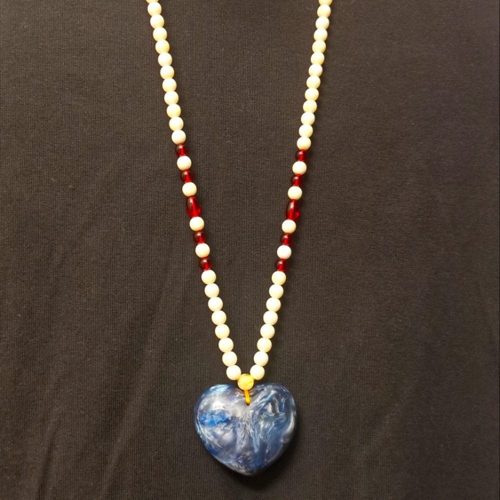 Amber heart shaped pendant long necklace.